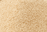 Close-up of beige sand texture